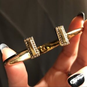Kate Spade gold T bracelet bangle